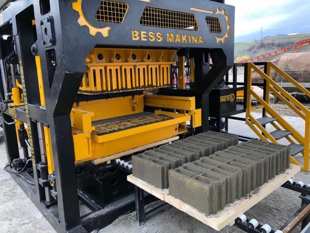 Bess Machinery block-making equipment producing hollow blocks