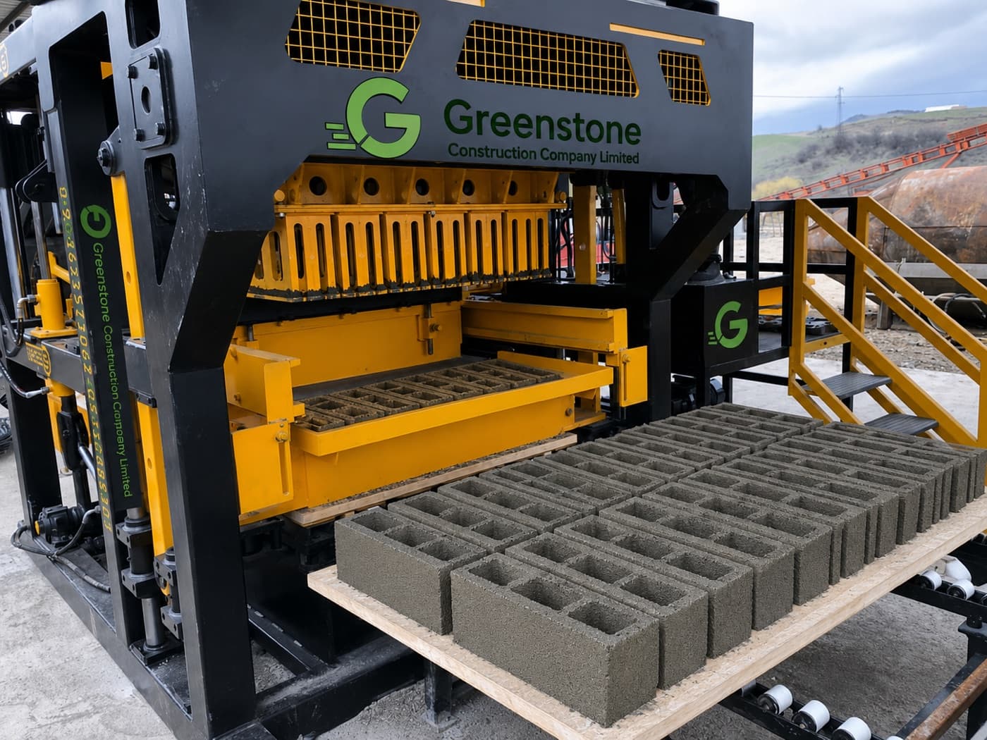 Greenstone production yard with hollow blocks ready for delivery
